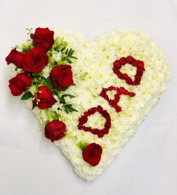<h2>Bespoke Personalised Heart-Shaped Design | Funeral Flowers</h2>
<ul>
<li>Approximate Size W 50cm H 50cm</li>
<li>Hand created personalised white heart in fresh flowers</li>
<li>To give you the best we may occasionally need to make substitutes</li>
<li>Funeral Flowers will be delivered at least 2 hours before the funeral</li>
<li>For delivery area coverage see below</li>
</ul>
<br>
<h2><br />Liverpool Flower Delivery</h2>
<p>We have a wide selection of Funeral Hearts offered for Liverpool Flower Delivery. Funeral Hearts can be provided for you in Liverpool, Merseyside and we can organize Funeral flower deliveries for you nationwide. Funeral Flowers can be delivered to the Funeral directors or a house address. They can not be delivered to the crematorium or the church.</p>
<br>
<h2>Flower Delivery Coverage</h2>
<p>Our shop delivers funeral flowers to the following Liverpool postcodes L1 L2 L3 L4 L5 L6 L7 L8 L11 L12 L13 L14 L15 L16 L17 L18 L19 L24 L25 L26 L27 L36 L70 If your order is for an area outside of these we can organise delivery for you through our network of florists. We will ask them to make as close as possible to the image but because of the difference in stock and sundry items, it may not be exact.</p>
<br>
<h2>Liverpool Funeral Flowers | Hearts</h2>
<p>This beautiful classic heart-shaped design covered with a mass of white double spray chrysanthemums with a delicate spray of roses and lisanthus can be personalised with either DAD or MUM which can be written in any colour.</p>
<br>
<p>When a heart is sent as a funeral tribute it is symbolic of comfort in ones last resting place. It makes deeply personal statement that is indicative of the love and compassion felt by immediate family or closely bereaved.</p>
<br>
<p>Contents of the product:14 inch heart frame, 20 white chrysanthemums, 8 large-headed roses and 2 lisianthus, together with personalised DAD or MUM in red, blue or pink.</p>
<br>
<h2>Best Florist in Liverpool</h2>
<p>Trust Award-winning Liverpool Florist, Booker Flowers and Gifts, to deliver funeral flowers fitting for the occasion delivered in Liverpool, Merseyside and beyond. Our funeral flowers are handcrafted by our team of professional fully qualified who not only lovingly hand make our designs but hand-deliver them, ensuring all our customers are delighted with their flowers. Booker Flowers and Gifts your local Liverpool Flower shop.</p>
<p><br /><br /></p>
<p><em>Jane Catherine and family - Review by post - Funeral Florist Liverpool</em></p>
<br>
<p><em>Thank you so much for the amazing flowers you arranged for our mum she would have loved them. Love Jane, Catherine and family</em></p>